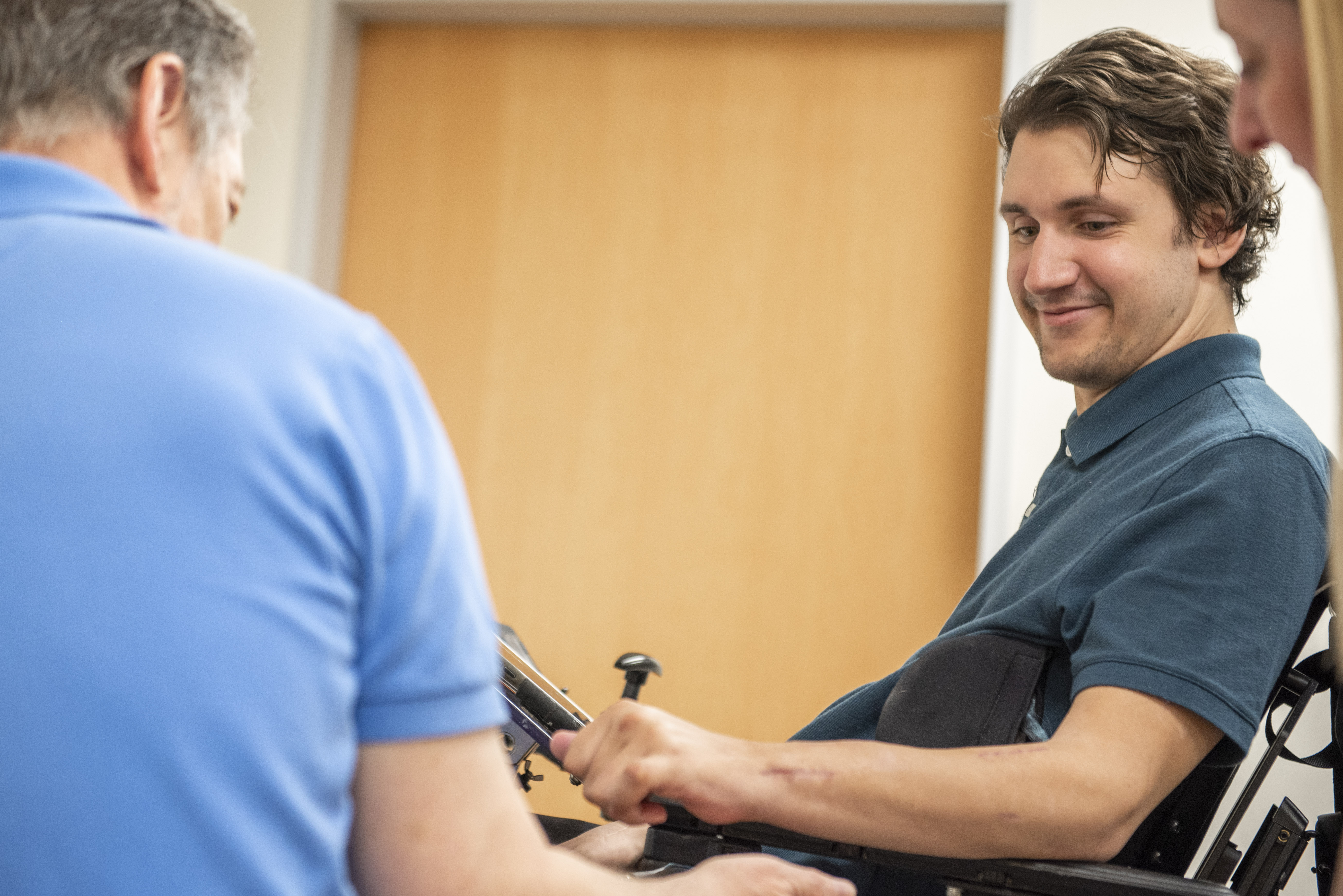 Clinical trial participant using the COSMIIC System